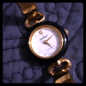 Gold and Black Bangle Watch